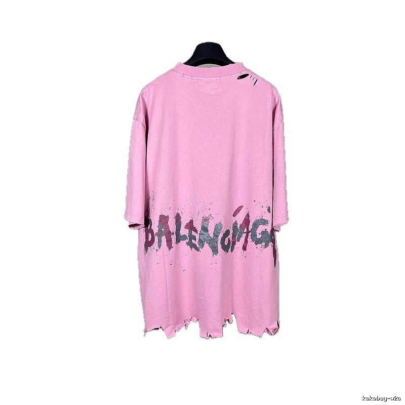 Balenciaga's pink T-shirt with a hole and graffiti style